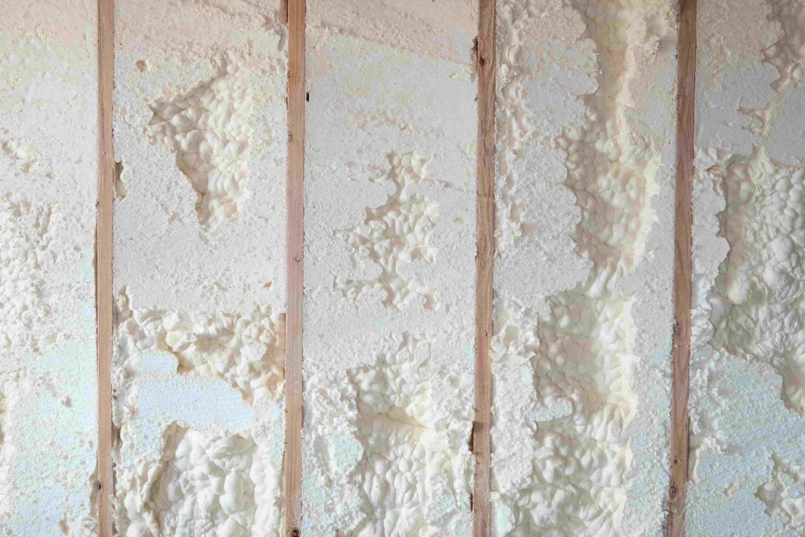 A plumber repairing a sump pump in a flooded basement