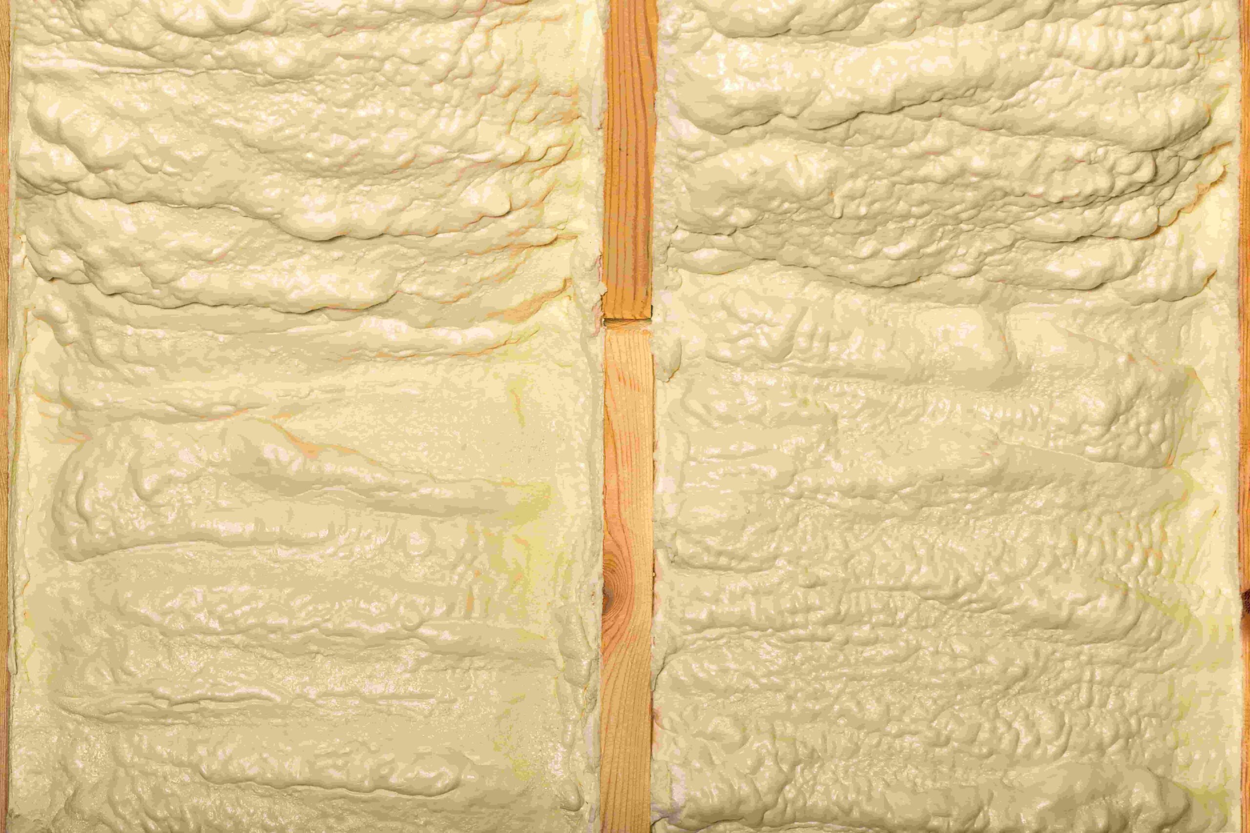 A plumber repairing a sump pump in a flooded basement